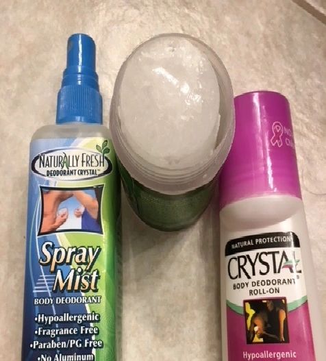 Three hypoallergenic deodorant products on display.