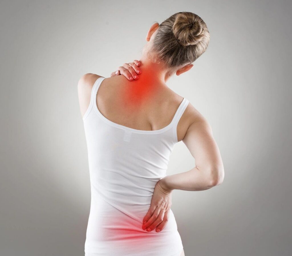 Woman with neck and lower back pain.