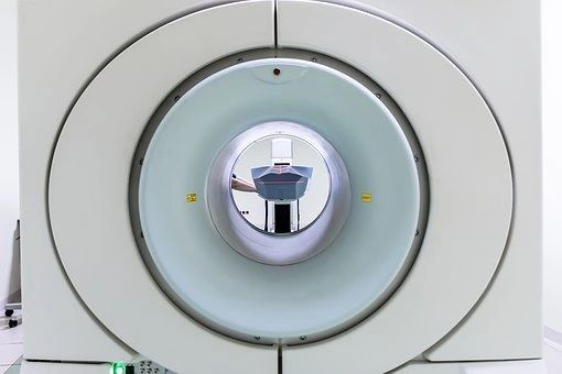 MRI machine tunnel view, hospital imaging equipment.