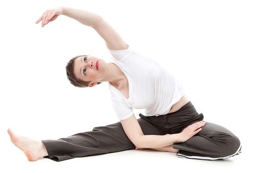 Woman doing a side stretch exercise.