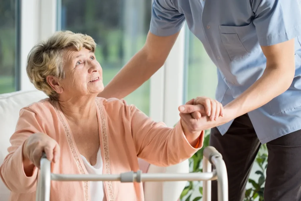Elderly woman using a walker