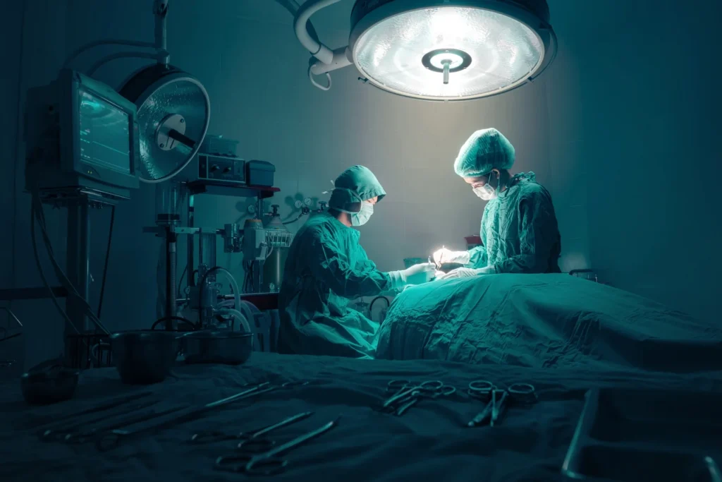 Two surgeons performing surgery in an operating room