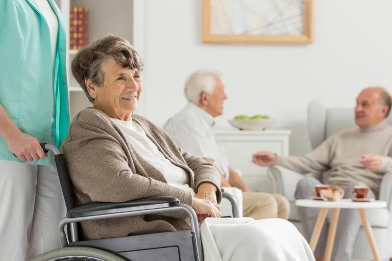 Smiling senior woman in a nursing home