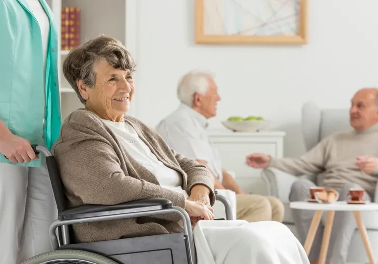 Smiling senior woman in a nursing home